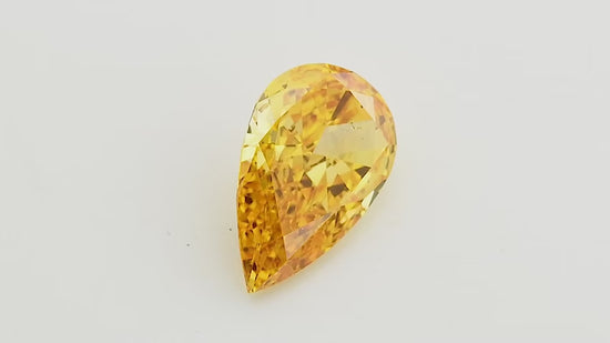 0.72 Carat Fancy Vivid Yellowish Orange Pear Diamond SI1 GIA