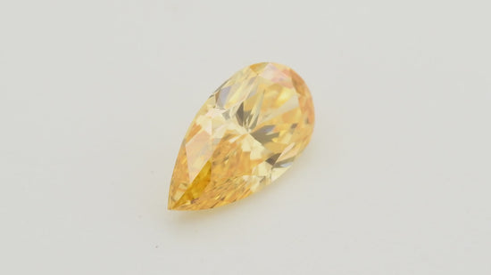 0.55 Carat Fancy Vivid Yellow Orange Pear Diamond SI1 GIA