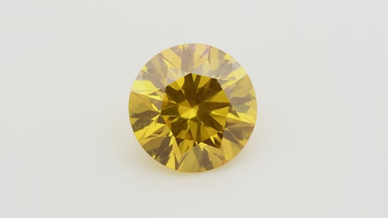 0.33 Carat Fancy Intense Orange Yellow Round Diamond VVS2 GIA