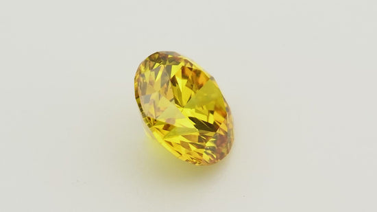 0.51 Carat Fancy Vivid Orangy Yellow Round Diamond VS2 GIA