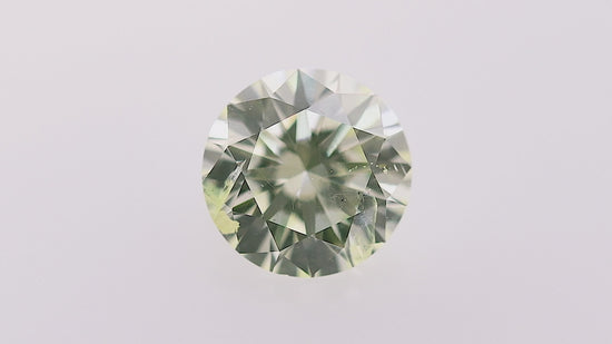0.68 Carat Fancy Light Yellow Green Round Brilliant Diamond I1 GIA